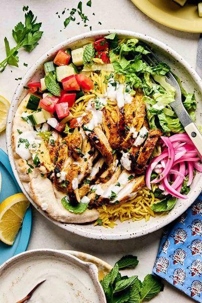 Chicken Shawarma with Turmeric Rice and Cucumber-Tomato Salad